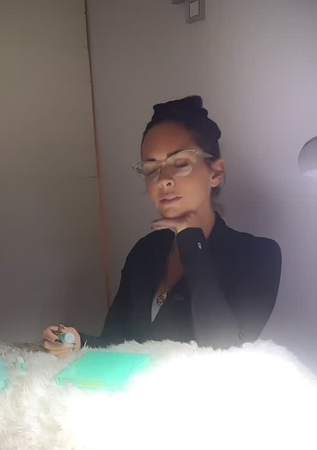 Megan at her lash station